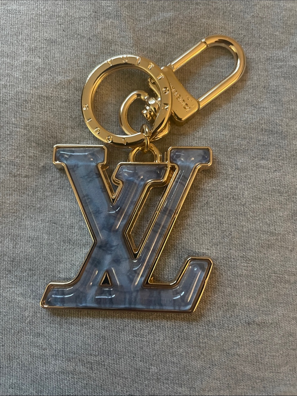 Louis Vuitton gradient Light Blue Marbled Key Charm with Gold toned Hardware
